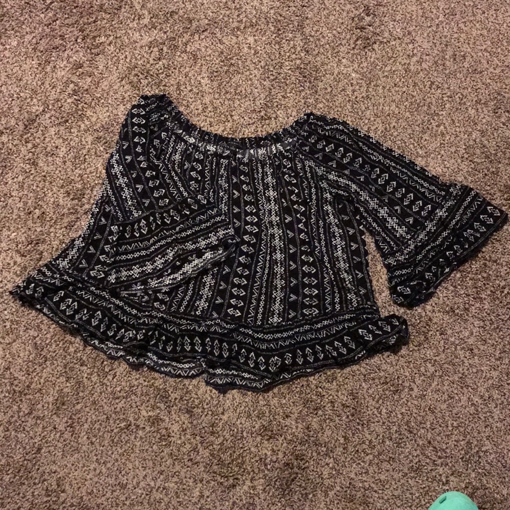 Semi cropped flowing off the shoulder shirt
